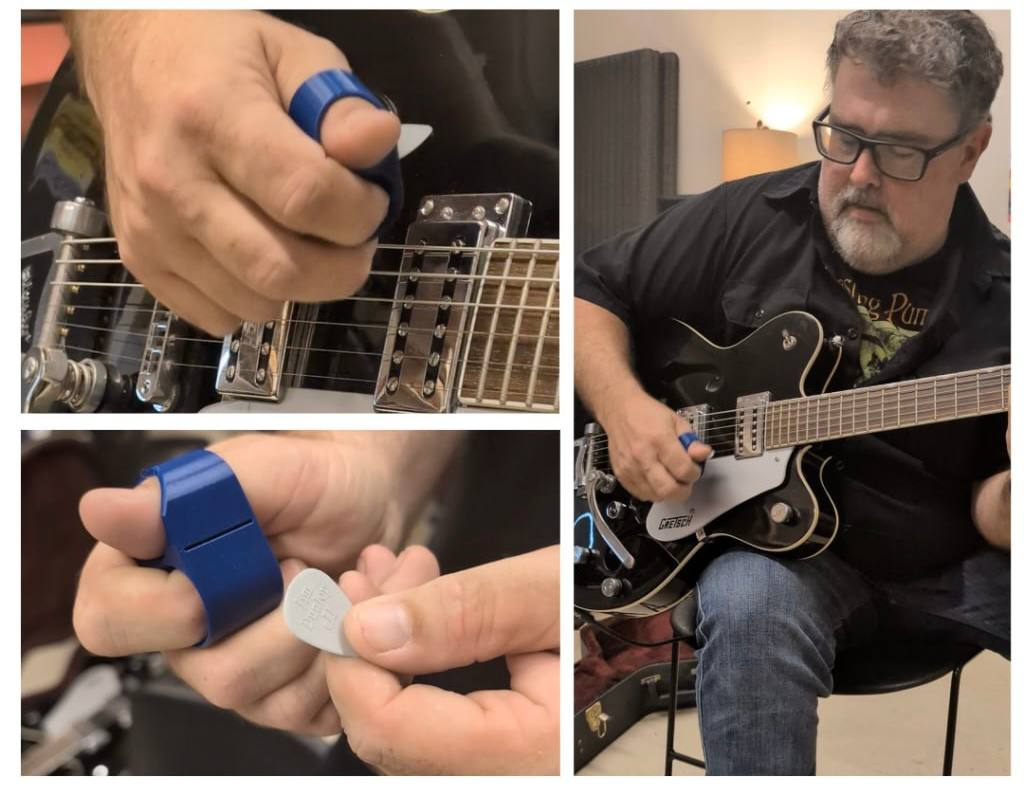 One of Robin's completed project: a customized guitar pick for client, Sean Gosse